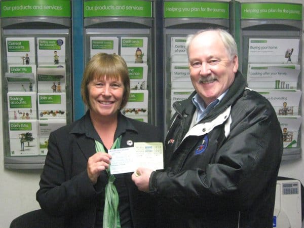 Dennis Fenton presents a cheque for £1750 to Loons Lottery Jackpot winner, Pamela Elms Dennis Fenton presents a cheque for £1750 to Loons Lottery Jackpot winner, Pamela Elms