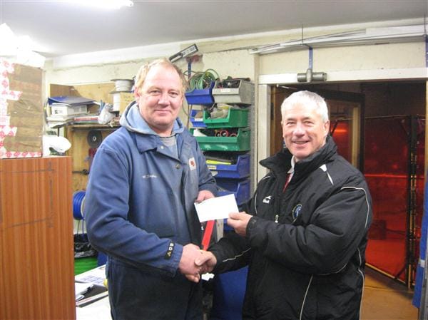 Bob Charlton is pictured presenting the £1500 Cheque to Mike Stephen Loons Lottery Presentation