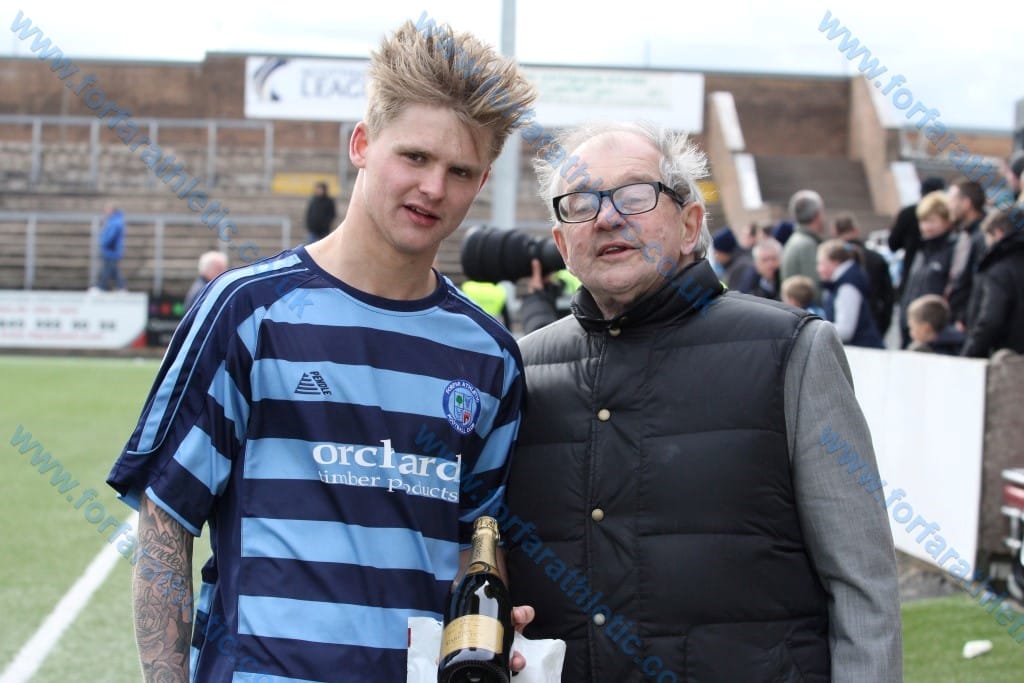 Lord Lyell of Kinnordy presenting Michael Travis with his MOTM award in May 2015 lord lyell